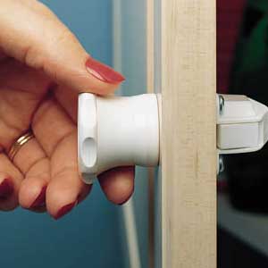 Get child proof locks installed in kitchen